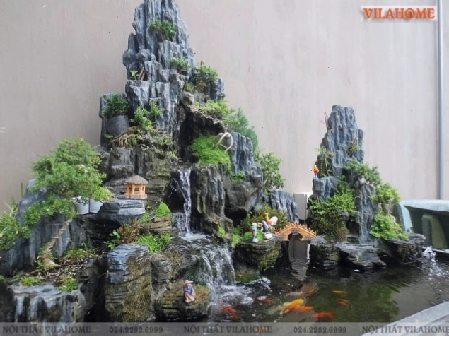 Thác nước phong thủy kết hợp hòn non bộ ngoài trời tạo cảnh quan sinh động